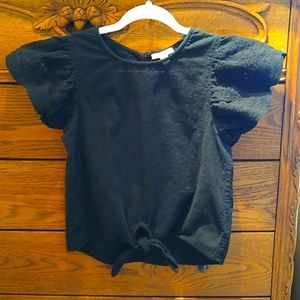Adorable black top with cute angel sleeves great for summer in great condition.